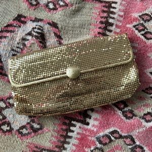 Gold metal mesh clutch
